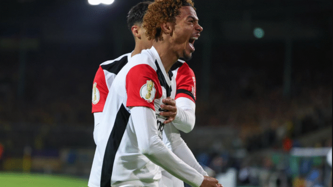 Ekitike celebrating Bundesliga goal