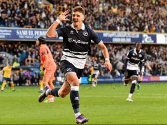 Ivanovic celebrating a goal for Millwall - "The Serbian striker's 13-goal season has Premier League clubs circling