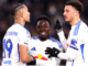 Leeds United's Mateo Joseph celebrates with Ethan Ampadu and Wilfried Gnonto