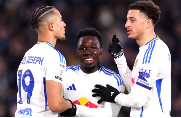 Leeds United's Mateo Joseph celebrates with Ethan Ampadu and Wilfried Gnonto